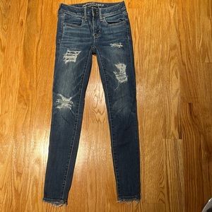 Dark wash ripped skinny jeans